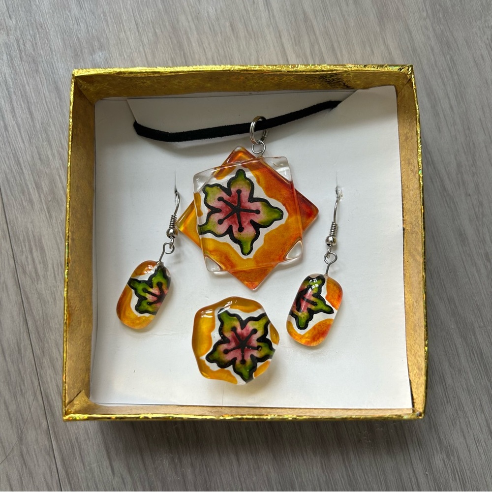 Orange floral handmade jewelry set from Ecuador